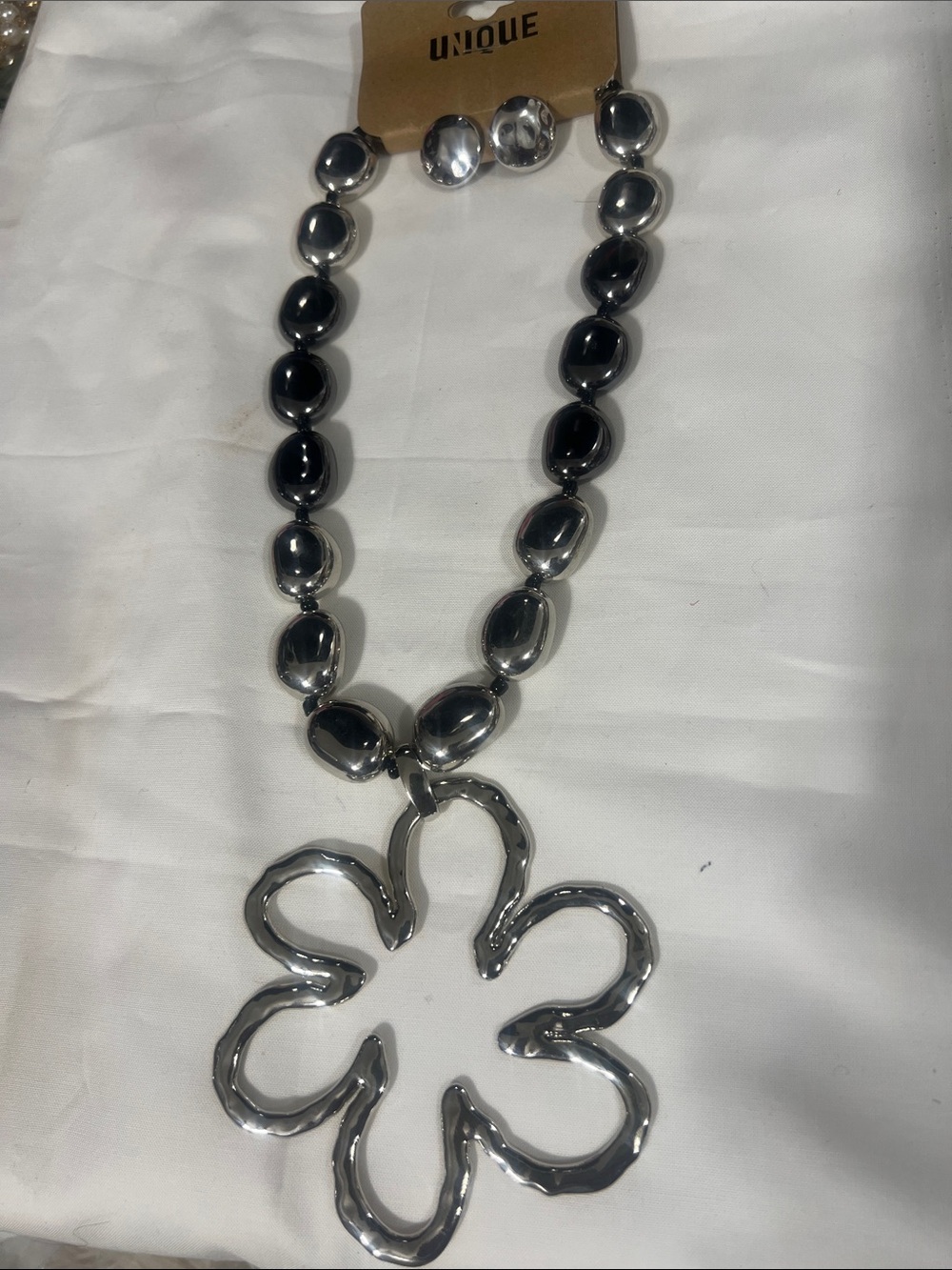 Nique Silver-Tone Beaded Necklace with Open Flower Pendant